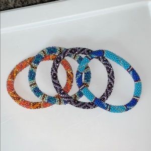 four beaded brackets — various colors